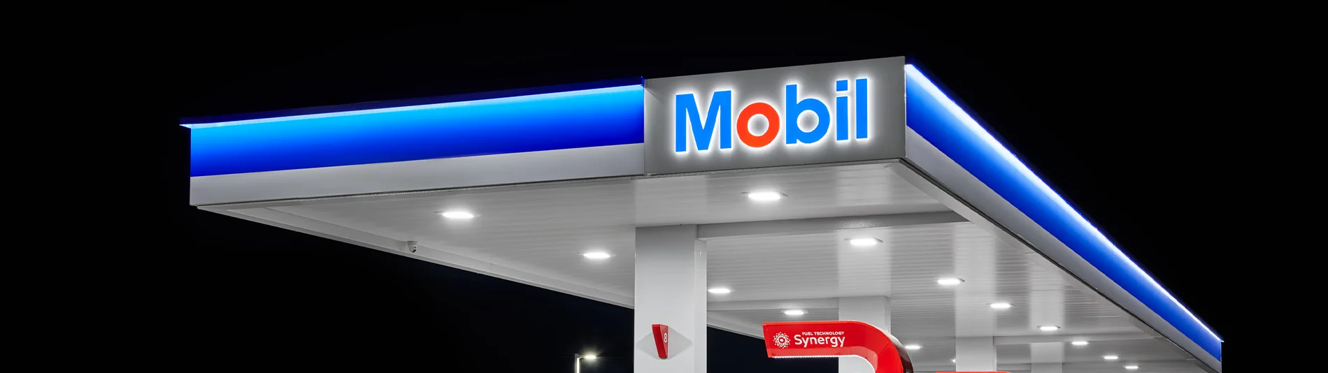 Mobil gas station sign at night